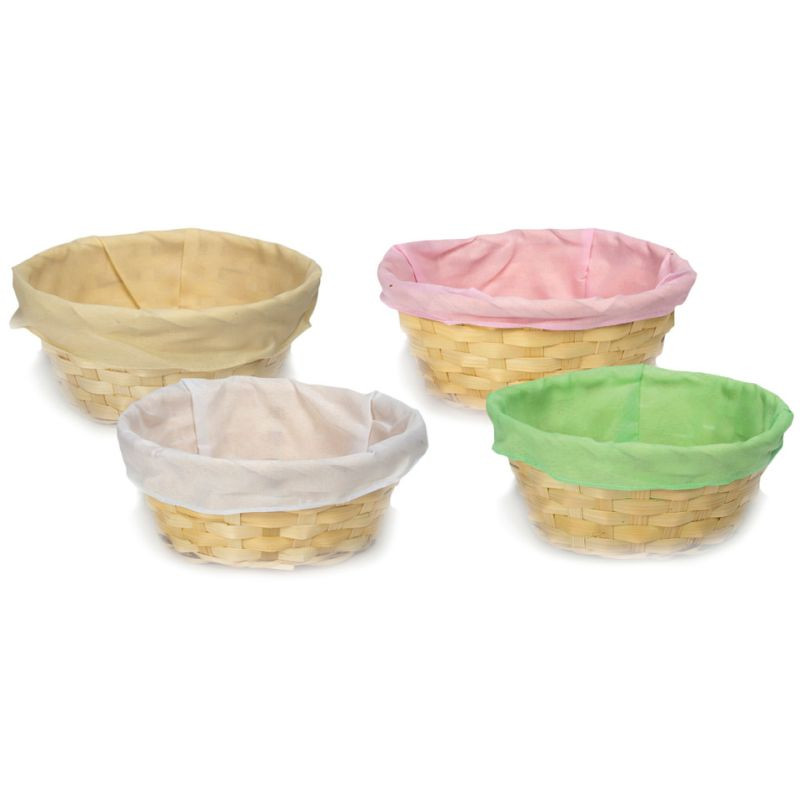 Runder Osterkorb aus Bambus mit Stoffeinsatz in frühlingshaften Farben.